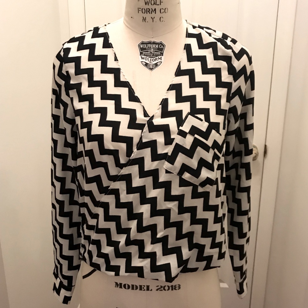 Black/White ZigZag Long Sleeve Surplice Blouse.